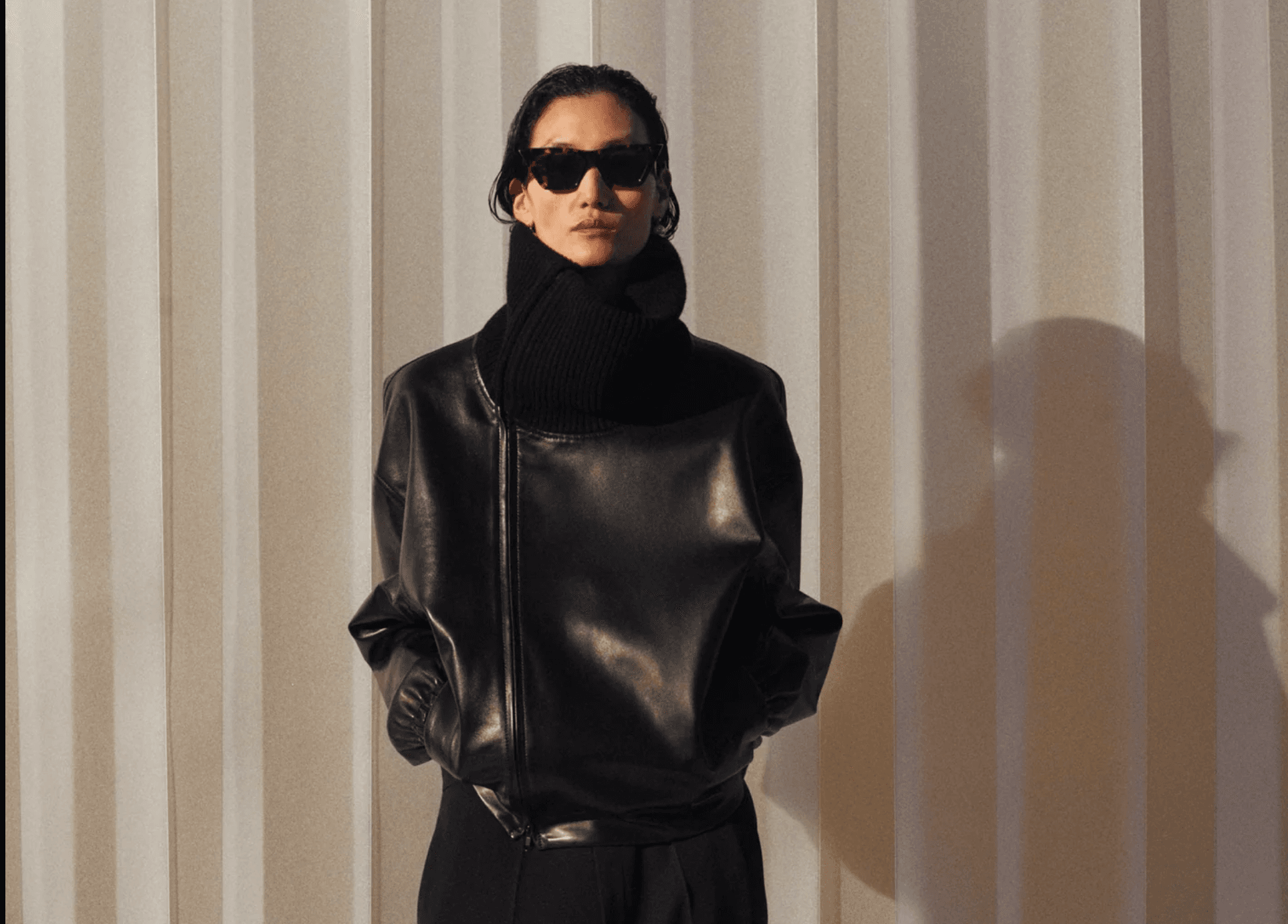 Fashion editorial: leather jacket, knitwear and sunglasses
