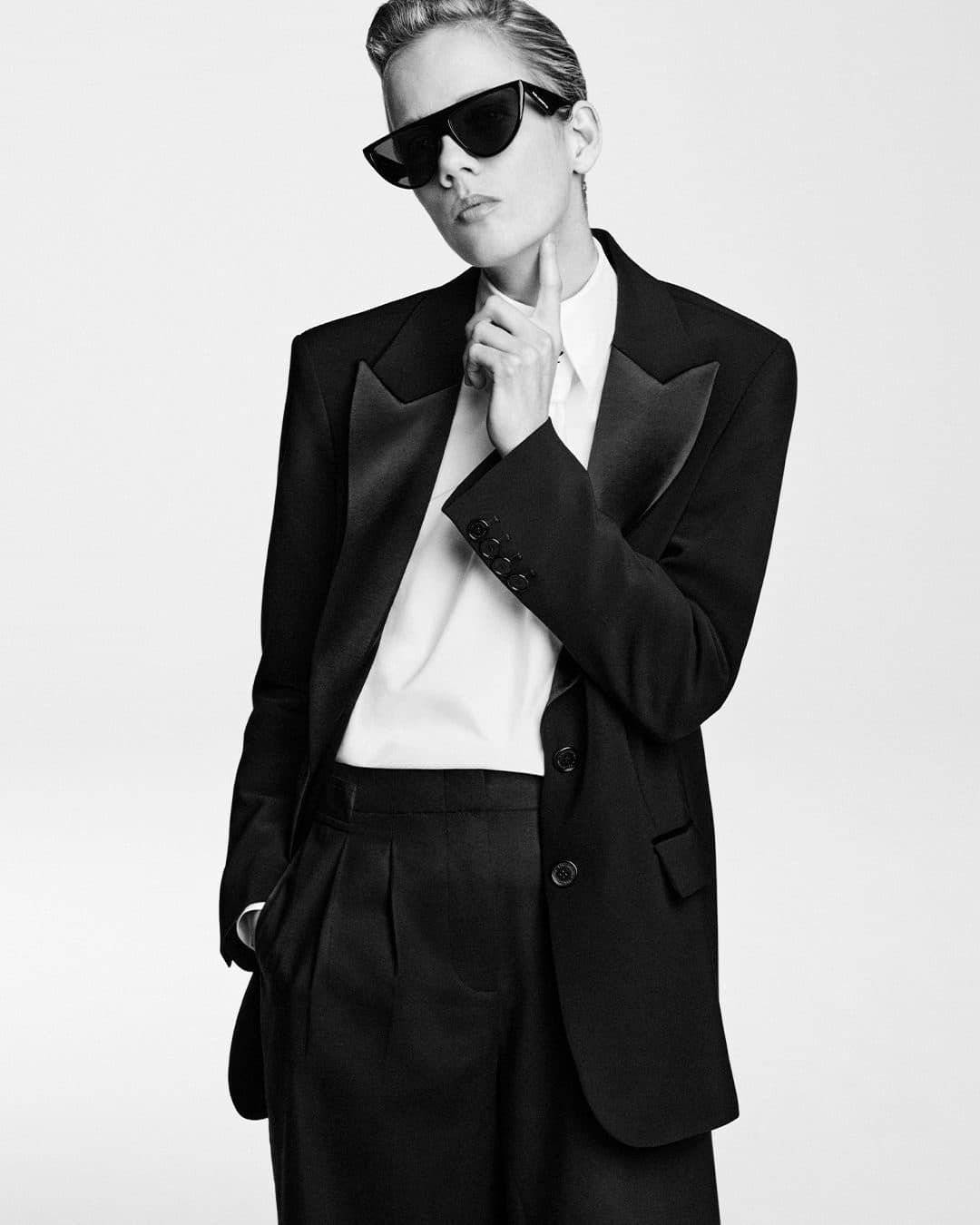 Karl Lagerfeld black-and-white portrait with tailoring and sunglasses